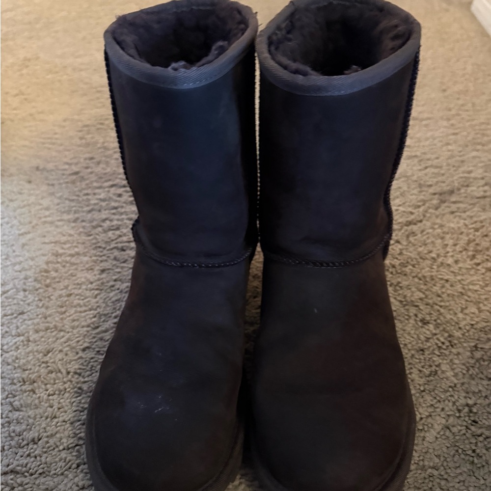 Ugg boots with weather resistant bottoms